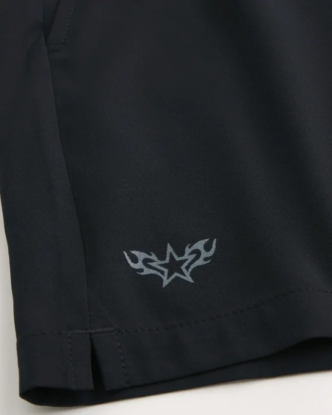 Actieve korte broek met logo halverwege het bovenbeen Actieve korte broek met logo halverwege het bovenbeen