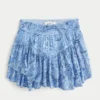 Asymmetrische mini-rok met gelaagde zoom