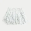 Asymmetrische mini-rok met gelaagde zoom