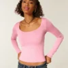 Baby-T-shirt met lange mouwen, naadloze stof en ronde hals Baby-T-shirt met lange mouwen, naadloze stof en ronde hals