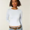 Baby-T-shirt met lange mouwen, naadloze stof en ronde hals Baby-T-shirt met lange mouwen, naadloze stof en ronde hals