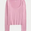 Baby-T-shirt met lange mouwen, naadloze stof en ronde hals Baby-T-shirt met lange mouwen, naadloze stof en ronde hals