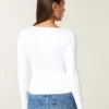 Baby-T-shirt met lange mouwen, naadloze stof en ronde hals Baby-T-shirt met lange mouwen, naadloze stof en ronde hals