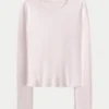 Baby-T-shirt met lange mouwen, naadloze stof en ronde hals Baby-T-shirt met lange mouwen, naadloze stof en ronde hals