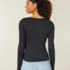 Baby-T-shirt met lange mouwen, naadloze stof en vierkante hals Baby-T-shirt met lange mouwen, naadloze stof en vierkante hals