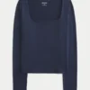 Baby-T-shirt met lange mouwen, naadloze stof en vierkante hals Baby-T-shirt met lange mouwen, naadloze stof en vierkante hals