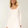 Babydoll-sweatermini-jurk met strik aan de achterkant