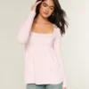 Babydoll-top met lange mouwen en eenvoudige kanten rand