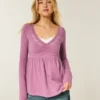 Babydoll-top met lange mouwen en geplooide buste Babydoll-top met lange mouwen en geplooide buste