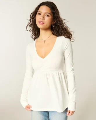 Babydoll-top met lange mouwen en geplooide buste