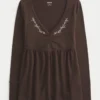 Babydoll-top met lange mouwen en geplooide buste Babydoll-top met lange mouwen en geplooide buste