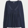 Babydoll-top met lange mouwen en geplooide buste Babydoll-top met lange mouwen en geplooide buste