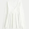 Babydoll-top met lange mouwen en geplooide buste Babydoll-top met lange mouwen en geplooide buste