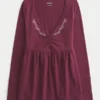 Babydoll-top met lange mouwen en geplooide buste Babydoll-top met lange mouwen en geplooide buste