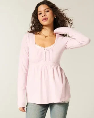 Babydoll-top met lange mouwen en henleykraag