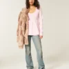 Babydoll-top met lange mouwen en henleykraag Babydoll-top met lange mouwen en henleykraag