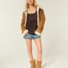 Babydoll-top met lange mouwen en henleykraag Babydoll-top met lange mouwen en henleykraag
