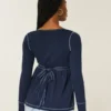 Babydoll-top met lange mouwen en henleykraag Babydoll-top met lange mouwen en henleykraag