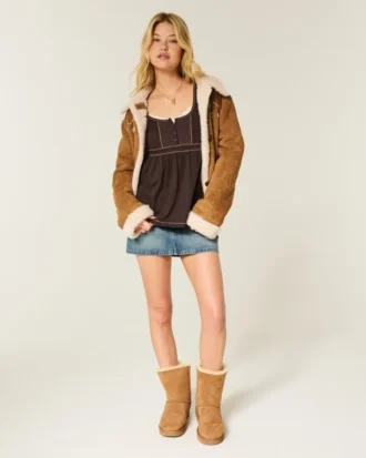 Babydoll-top met lange mouwen en henleykraag