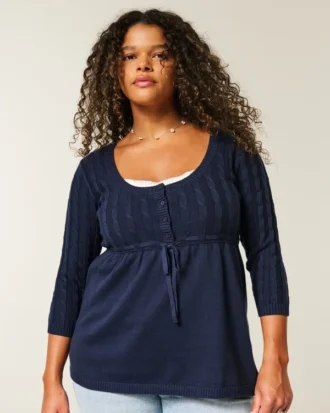 Babydoll-trui met kabelpatroon