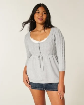 Babydoll-trui met kabelpatroon