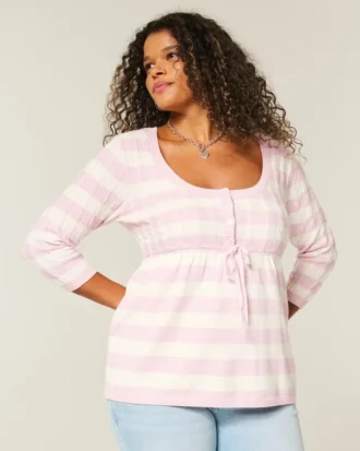 Babydoll-trui met kabelpatroon