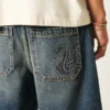 Baggy denim short met slangengrafiek Baggy denim short met slangengrafiek