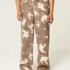 Baggy jeans met lage taille en koeienprint