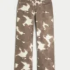 Baggy jeans met lage taille en koeienprint