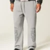 Baggy joggingbroek met dubbele slangengrafiek