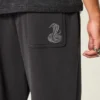 Baggy joggingbroek met slangengrafiek