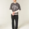 Baggy joggingbroek met spinborduursel Baggy joggingbroek met spinborduursel