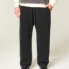 Baggy joggingbroek met spinborduursel Baggy joggingbroek met spinborduursel