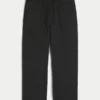 Baggy joggingbroek met spinborduursel Baggy joggingbroek met spinborduursel