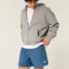 Baggy voetbalshort tot halverwege het bovenbeen