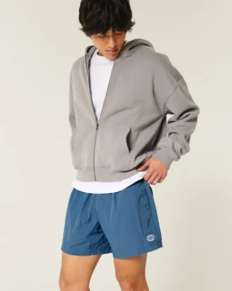 Baggy voetbalshort tot halverwege het bovenbeen