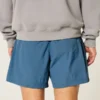 Baggy voetbalshort tot halverwege het bovenbeen