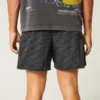 Baggy voetbalshort tot halverwege het bovenbeen Baggy voetbalshort tot halverwege het bovenbeen