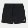 Baggy voetbalshort tot halverwege het bovenbeen Baggy voetbalshort tot halverwege het bovenbeen