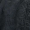 Baggy voetbalshort tot halverwege het bovenbeen Baggy voetbalshort tot halverwege het bovenbeen