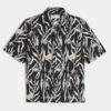 Boxy tropisch vispatroon linnenmix shirt