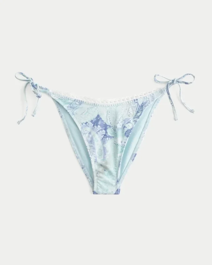 Cheeky bikinibroekje met haakwerkachtige rand en strikbandjes aan de zijkant