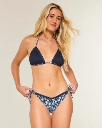 Cheeky bikinibroekje met haakwerkachtige rand en strikbandjes aan de zijkant