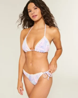 Cheeky bikinibroekje met haakwerkachtige rand en strikbandjes aan de zijkant