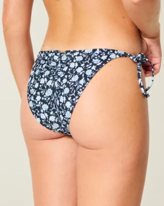 Cheeky bikinibroekje met haakwerkachtige rand en strikbandjes aan de zijkant