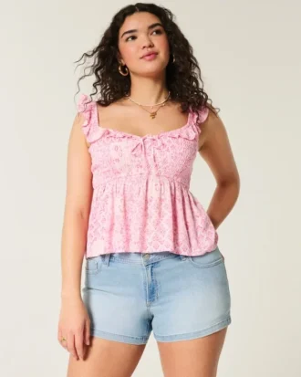 Curvy laag uitgesneden lichtgewassen denim shortje met bloemenborduursels