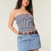 Curvy laag uitgesneden mini-rokje van medium gewassen denim Curvy laag uitgesneden mini-rokje van medium gewassen denim
