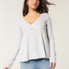 Easy babydolltop met lange mouwen en pointelle