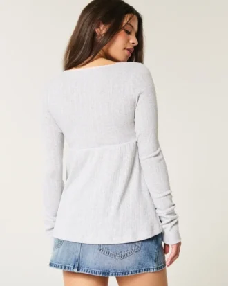 Easy babydolltop met lange mouwen en pointelle