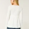 Easy babydolltop met lange mouwen en pointelle